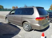 ✅ 2004 Honda Odyssey EX-L • VIN: 5FNRL180X4B146437 • Lot: 43630775. Listed on IAAI with 70,398 mi. Free auction sales archive from the USA and detailed vehicle history report at DreamBid. Image 3.
