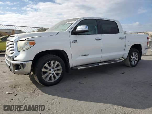 ✅ 2014 Toyota Tundra Limited • VIN: 5TFFY5F15EX164147 • Lot: 81899694. Listed on Copart with 199,941 mi. Free auction sales archive from the USA and detailed vehicle history report at DreamBid. Image 1.