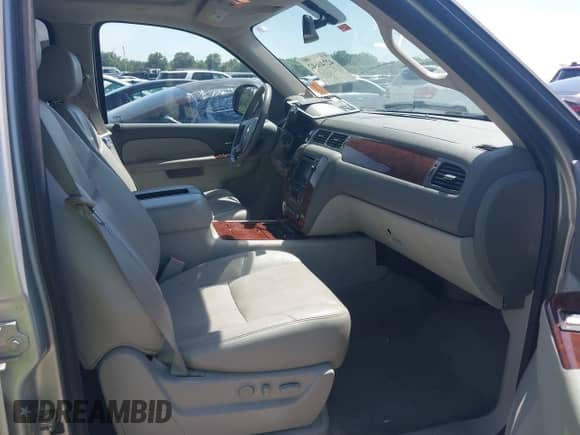 2011 Chevrolet Tahoe LTZ with VIN 1GNSKCE03BR368837, listed as a IAAI auction lot 42741642 with 166,196 mi miles and . Bid and sale history available at DreamBid. Image 5.