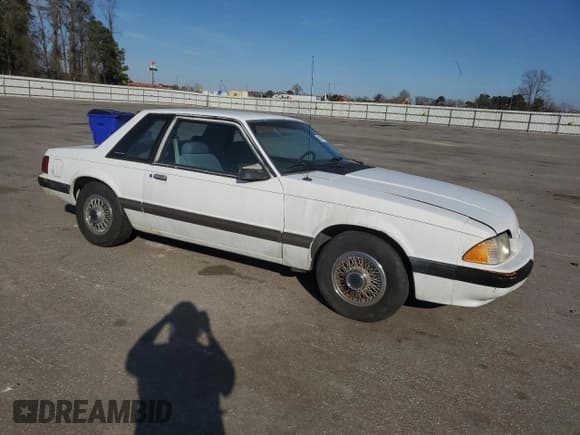 ✅ 1990 Ford Mustang • VIN: 1FACP40A7LF205928 • Lot: 49009295. Listed on Copart with 69,634 mi. Free auction sales archive from the USA and detailed vehicle history report at DreamBid. Image 4.