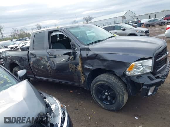 2019 Ram 1500 Tradesman with VIN 1C6RR7FG0KS534933, listed as a IAAI auction lot 41845978 with 82,600 mi miles and . Bid and sale history available at DreamBid. Image 14.