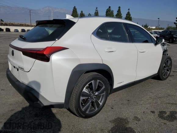 ✅ 2022 Lexus UX 250h • VIN: JTHX9JBH2N2056285 • Lot: 87221214. Listed on Copart with 33,377 mi. Free auction sales archive from the USA and detailed vehicle history report at DreamBid. Image 3.