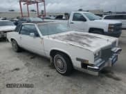 ✅ 1984 Cadillac Eldorado • VIN: 1G6AL5783EE654296 • Lot: 74945374. Listed on Copart with 37,040 mi. Free auction sales archive from the USA and detailed vehicle history report at DreamBid. Image 4.