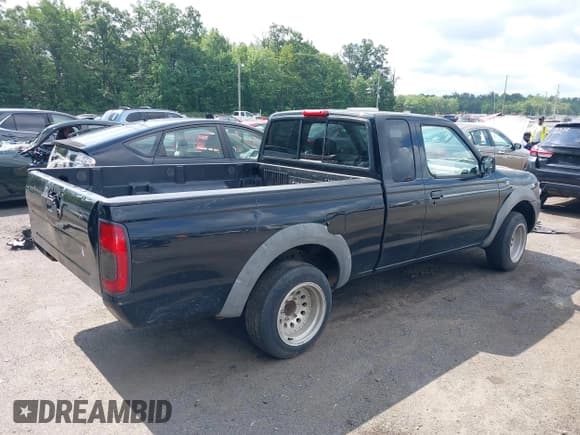 ✅ 2001 Nissan Frontier XE • VIN: 1N6DD26S31C321005 • Lot: 42725765. Listed on IAAI with 234,602 mi. Free auction sales archive from the USA and detailed vehicle history report at DreamBid. Image 4.