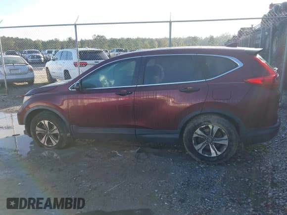 ✅ 2018 Honda CR-V LX • VIN: 2HKRW5H31JH409808 • Лот: 43400344. Опубликован ранее на IAAI с пробегом 97 173 миль. Бесплатный доступ к архиву аукционных продаж из США и подробный отчёт об истории автомобиля на DreamBid. Изображение 14.