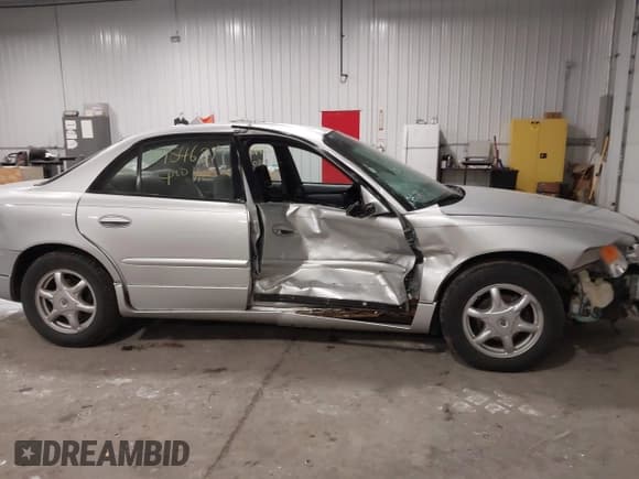 ✅ 2002 Buick Regal LS • VIN: 2G4WB52K821171470 • Lot: 41954621. Listed on IAAI with Not provided. Free auction sales archive from the USA and detailed vehicle history report at DreamBid. Image 14.