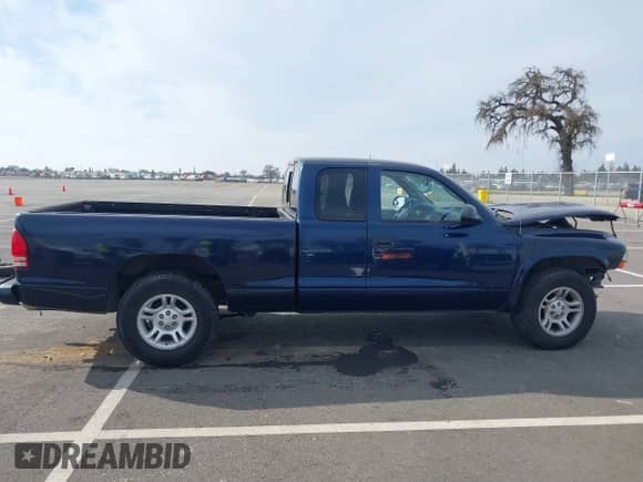 2004 Dodge Dakota Sport z VIN 1D7GL32NX4S690551, wystawiony jako IAAI lot #41421933 z przebiegiem 94 638 mil mil oraz . Historia ofert i sprzedaży dostępna na DreamBid. Obrazek 13.