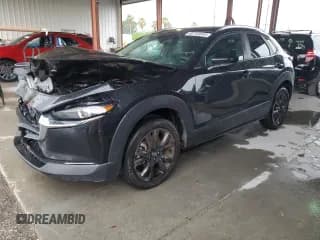 ✅ 2022 Mazda CX-30 2.5 Turbo • VIN: 3MVDMBAY3NM458995 • Lot: 60783645. Listed on Copart with 45,618 mi. Free auction sales archive from the USA and detailed vehicle history report at DreamBid. Image 1.