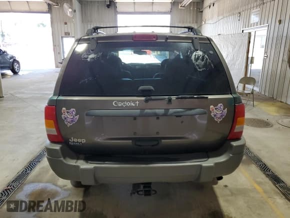✅ 1999 Jeep Grand Cherokee Laredo • VIN: 1J4GW58S2XC765424 • Lot: 71172935. Listed on Copart with 146,248 mi. Free auction sales archive from the USA and detailed vehicle history report at DreamBid. Image 6.