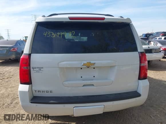 2015 Chevrolet Tahoe LT z VIN 1GNSKBKC3FR279459, wystawiony jako IAAI lot #43349972 z przebiegiem 112 043 mil mil oraz . Historia ofert i sprzedaży dostępna na DreamBid. Obrazek 16.