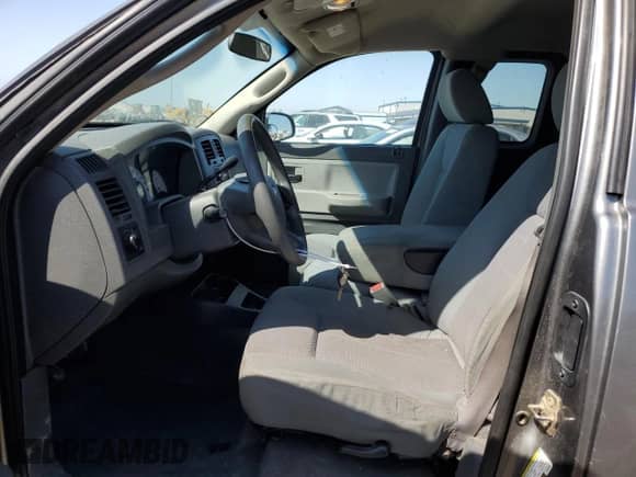 2005 Dodge Dakota ST z VIN 1D7HW22K65S204587, wystawiony jako Copart lot #74038824 z przebiegiem 176 919 mil mil oraz Szkoda całkowita • Salvage title. Historia ofert i sprzedaży dostępna na DreamBid. Obrazek 7.