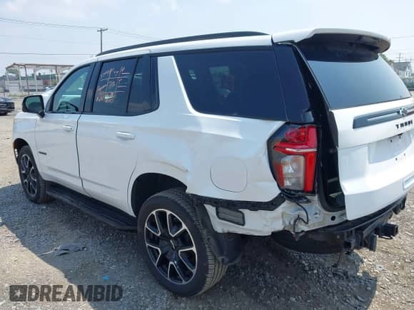 2023 Chevrolet Tahoe RST z VIN 1GNSKRKD4PR334794, wystawiony jako IAAI lot #42717947 z przebiegiem 55 265 mil mil oraz . Historia ofert i sprzedaży dostępna na DreamBid. Obrazek 3.