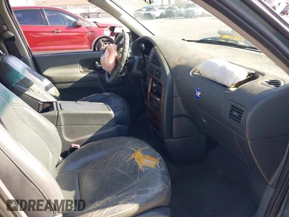 ✅ 2000 Nissan Quest GXE • VIN: 4N2XN11T8YD805874 • Лот: 41940081. Опубликован ранее на IAAI с пробегом 206 269 миль. Бесплатный доступ к архиву аукционных продаж из США и подробный отчёт об истории автомобиля на DreamBid. Изображение 5.