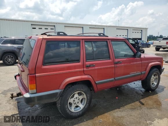 ✅ 1999 Jeep Cherokee Sport • VIN: 1J4FT68SXXL669549 • Lot: 62367015. Listed on Copart with 194,446 mi. Free auction sales archive from the USA and detailed vehicle history report at DreamBid. Image 3.