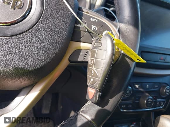 ✅ 2015 Jeep Cherokee Latitude • VIN: 1C4PJMCB3FW719832 • Lot: 42204741. Listed on IAAI with 96,401 mi. Free auction sales archive from the USA and detailed vehicle history report at DreamBid. Image 11.