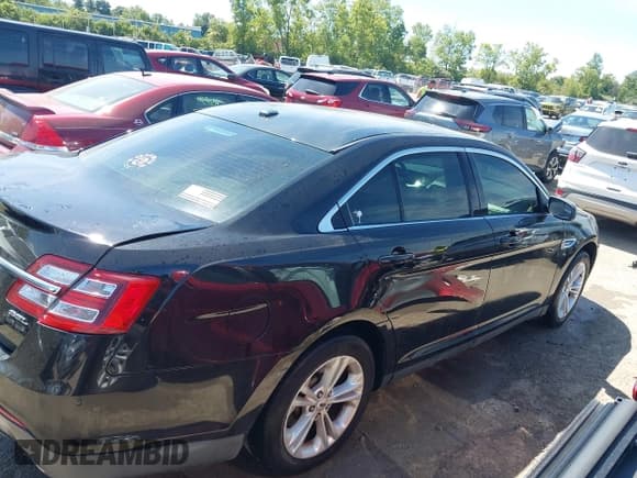 ✅ 2014 Ford Taurus SEL • VIN: 1FAHP2E94EG156578 • Лот: 43043205. Опубликован ранее на IAAI с пробегом 126 995 миль. Бесплатный доступ к архиву аукционных продаж из США и подробный отчёт об истории автомобиля на DreamBid. Изображение 13.