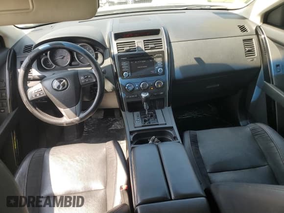 ✅ 2015 Mazda CX-9 Touring • VIN: JM3TB2CA8F0452186 • Lot: 71797715. Wystawiony na Copart z przebiegiem 152 637 mil. Bezpłatny archiwum sprzedaży aukcyjnych z USA i szczegółowy raport historii pojazdu na DreamBid. Zdjęcie 8.