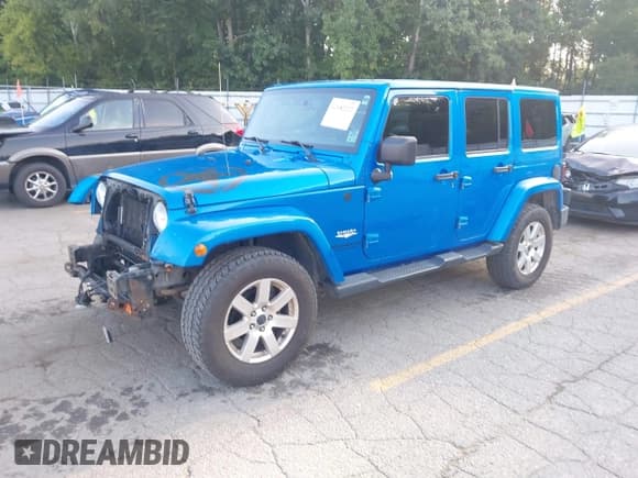 ✅ 2015 Jeep Wrangler Unlimited Sahara • VIN: 1C4BJWEG2FL736489 • Lot: 42982322. Listed on IAAI with 142,742 mi. Free auction sales archive from the USA and detailed vehicle history report at DreamBid. Image 2.