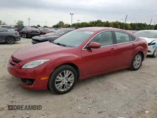 ✅ 2009 Mazda 6 i Grand Touring • VIN: 1YVHP82A695M21556 • Lot: 82520495. Listed on Copart with 198,410 mi. Free auction sales archive from the USA and detailed vehicle history report at DreamBid. Image 1.