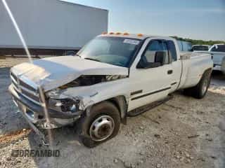 2002 Dodge 3500 z VIN 3B7MC33642M290317, wystawiony jako Copart lot #69352345 z przebiegiem 242 793 mil mil oraz Szkoda całkowita • Salvage title. Historia ofert i sprzedaży dostępna na DreamBid. Obrazek 1.