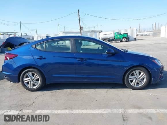 2019 Hyundai Elantra SEL z VIN 5NPD84LF7KH434634, wystawiony jako IAAI lot #43200937 z przebiegiem 76 488 mil mil oraz . Historia ofert i sprzedaży dostępna na DreamBid. Obrazek 13.