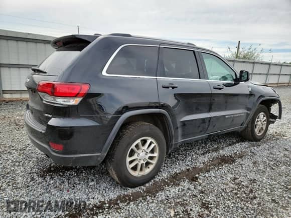 2020 Jeep Grand Cherokee Laredo E z VIN 1C4RJFAG3LC271091, wystawiony jako Copart lot #63903395 z przebiegiem 77 420 mil mil oraz Szkoda całkowita • Salvage title. Historia ofert i sprzedaży dostępna na DreamBid. Obrazek 3.