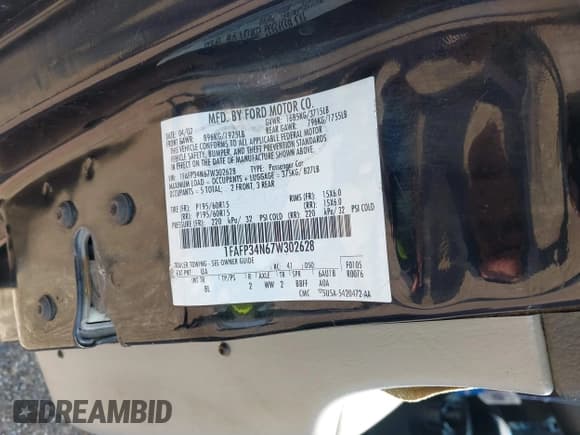 ✅ 2007 Ford Focus S • VIN: 1FAFP34N67W302628 • Lot: 42517438. Listed on IAAI with 163,343 mi. Free auction sales archive from the USA and detailed vehicle history report at DreamBid. Image 9.