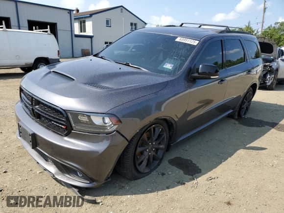 2018 Dodge Durango GT z VIN 1C4RDJDG7JC404857, wystawiony jako Copart lot #65951125 z przebiegiem 166 015 mil mil oraz Szkoda całkowita • Salvage title. Historia ofert i sprzedaży dostępna na DreamBid. Obrazek 1.