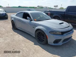 ✅ 2021 Dodge Charger Scat Pack Widebody • VIN: 2C3CDXGJ8MH601462 • Лот: 42924011. Опубликован ранее на IAAI с пробегом 45 847 миль. Бесплатный доступ к архиву аукционных продаж из США и подробный отчёт об истории автомобиля на DreamBid. Изображение 1.