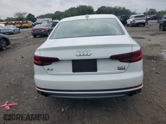 ✅ 2018 Audi A4 Premium • VIN: WAUDNAF4XJA125714 • Лот: 71890355. Опубликован ранее на Copart с пробегом 107 175 миль. Бесплатный доступ к архиву аукционных продаж из США и подробный отчёт об истории автомобиля на DreamBid. Изображение 6.