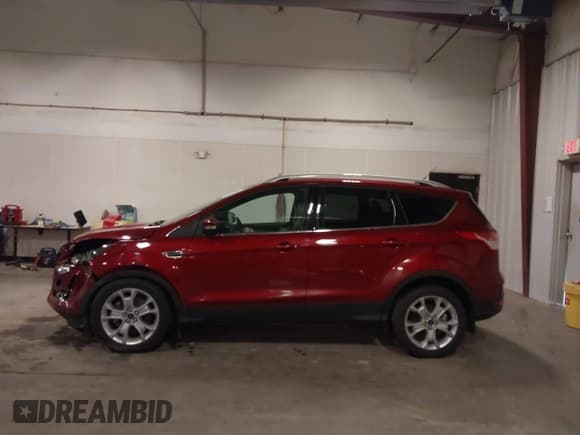 ✅ 2016 Ford Escape Titanium • VIN: 1FMCU9JX9GUC07406 • Lot: 43570767. Listed on IAAI with 86,421 mi. Free auction sales archive from the USA and detailed vehicle history report at DreamBid. Image 15.