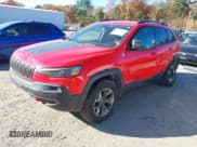 ✅ 2019 Jeep Cherokee Trailhawk • VIN: 1C4PJMBX7KD298488 • Lot: 40697687. Listed on IAAI with 127,060 mi. Free auction sales archive from the USA and detailed vehicle history report at DreamBid. Image 2.