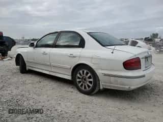 2003 Hyundai Sonata GLS с VIN KMHWF35H03A879762, выставлен на аукционе Copart как лот 84282744 с пробегом 192 132 миль миль и Списание • Salvage title. История ставок и продаж доступна на DreamBid. Изображение 2.