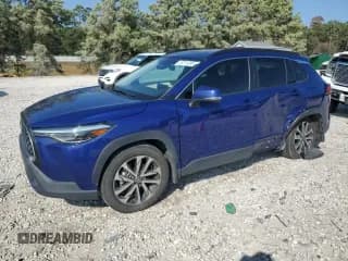 ✅ 2023 Toyota Corolla Cross XLE • VIN: 7MUDAAAG5PV051183 • Lot: 87211835. Listed on Copart with 34,039 mi. Free auction sales archive from the USA and detailed vehicle history report at DreamBid. Image 1.