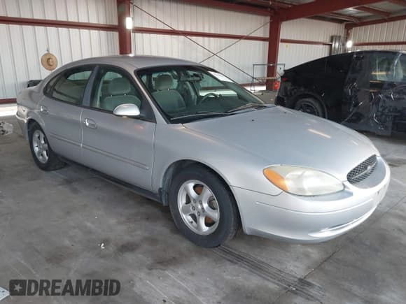 ✅ 2003 Ford Taurus SE • VIN: 1FAHP53U23G147092 • Lot: 43785029. Listed on IAAI with 324,781 mi. Free auction sales archive from the USA and detailed vehicle history report at DreamBid. Image 1.