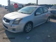 ✅ 2010 Nissan Sentra SR • VIN: 3N1AB6AP7AL637696 • Лот: 43013315. Опубликован ранее на IAAI с пробегом 163 382 миль. Бесплатный доступ к архиву аукционных продаж из США и подробный отчёт об истории автомобиля на DreamBid. Изображение 2.