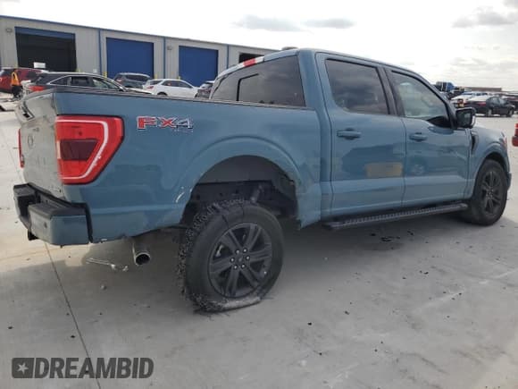 ✅ 2023 Ford F-150 Lariat • VIN: 1FTFW1E89PKE71401 • Lot: 82745035. Wystawiony na Copart z przebiegiem 39 610 mil. Bezpłatny archiwum sprzedaży aukcyjnych z USA i szczegółowy raport historii pojazdu na DreamBid. Zdjęcie 3.