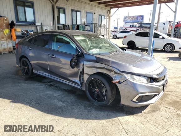 ✅ 2020 Honda Civic LX • VIN: 2HGFC2F6XLH580514 • Lot: 82677405. Listed on Copart with 71,866 mi. Free auction sales archive from the USA and detailed vehicle history report at DreamBid. Image 4.
