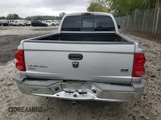2005 Dodge Dakota SLT с VIN 1D7HE48N65S138476, выставлен на аукционе Copart как лот 73561614 с пробегом 83 364 миль миль и Списание • Salvage title. История ставок и продаж доступна на DreamBid. Изображение 6.