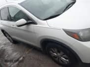 ✅ 2014 Honda CR-V EX-L • VIN: 5J6RM3H77EL045290 • Lot: 43729491. Listed on IAAI with 134,009 mi. Free auction sales archive from the USA and detailed vehicle history report at DreamBid. Image 13.