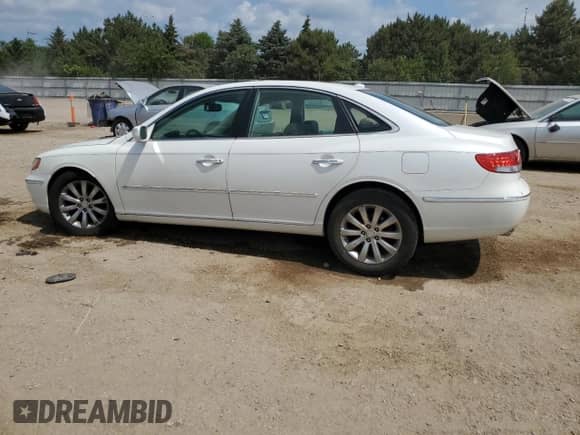 2008 Hyundai Azera Limited с VIN KMHFC46F78A333821, выставлен на аукционе Copart как лот 61246295 с пробегом 129 859 миль миль и Списание • Salvage title. История ставок и продаж доступна на DreamBid. Изображение 2.