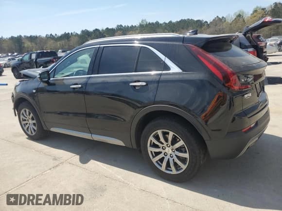 ✅ 2021 Cadillac XT4 FWD Premium Luxury • VIN: 1GYFZCR48MF002468 • Lot: 50878955. Listed on Copart with 76,034 mi. Free auction sales archive from the USA and detailed vehicle history report at DreamBid. Image 2.