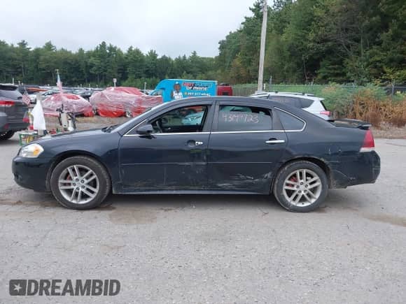 2012 Chevrolet Impala LTZ with VIN 2G1WC5E33C1155824, listed as a IAAI auction lot 43149723 with 148,084 mi miles and . Bid and sale history available at DreamBid. Image 14.