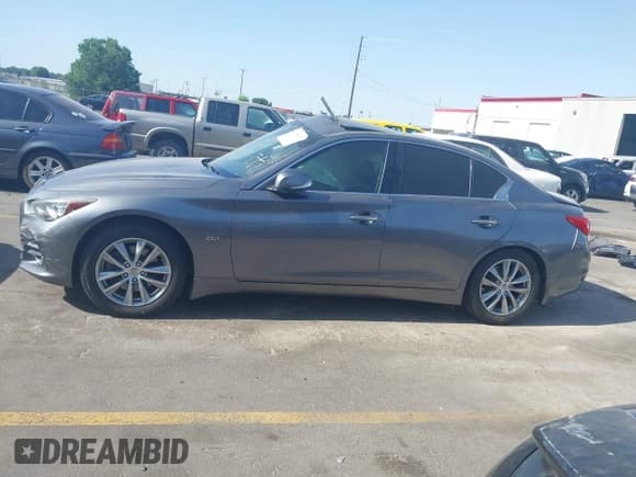 ✅ 2017 Infiniti Q50 Premium • VIN: JN1CV7AR3HM681699 • Lot: 42550423. Listed on IAAI with 90,144 mi. Free auction sales archive from the USA and detailed vehicle history report at DreamBid. Image 15.
