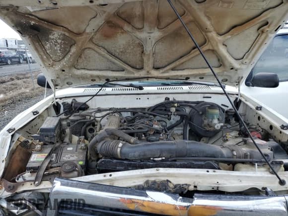 ✅ 1992 Toyota Pickup DLX • VIN: 4TARN01P4NZ021338 • Лот: 78283004. Опубликован ранее на Copart с пробегом 162 711 миль. Бесплатный доступ к архиву аукционных продаж из США и подробный отчёт об истории автомобиля на DreamBid. Изображение 12.