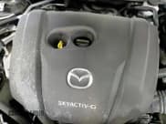 ✅ 2020 Mazda 3 Premium • VIN: JM1BPAEM1L1169495 • Лот: 41499405. Опубликован ранее на Copart с пробегом 54 059 миль. Бесплатный доступ к архиву аукционных продаж из США и подробный отчёт об истории автомобиля на DreamBid. Изображение 13.