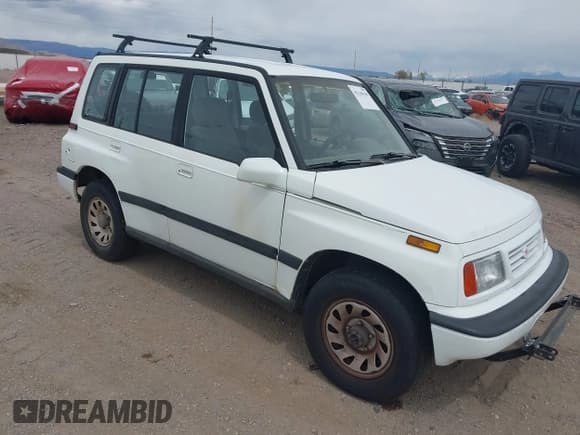 ✅ 1995 Suzuki Sidekick JX • VIN: 2S3TD03V8S6413255 • Lot: 42160109. Listed on IAAI with 225,454 mi. Free auction sales archive from the USA and detailed vehicle history report at DreamBid. Image 1.