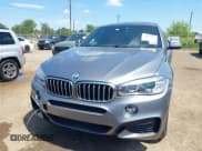 ✅ 2015 BMW X6 xDrive50i • VIN: 5UXKU6C54F0F93945 • Lot: 43042471. Listed on IAAI with 52,434 mi. Free auction sales archive from the USA and detailed vehicle history report at DreamBid. Image 12.