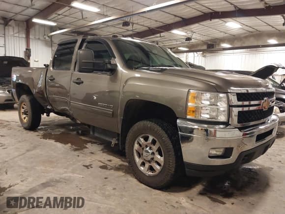 ✅ 2014 Chevrolet Silverado 2500HD LT • VIN: 1GC1KXC85EF131664 • Lot: 40820826. Listed on IAAI with 113,817 mi. Free auction sales archive from the USA and detailed vehicle history report at DreamBid. Image 1.