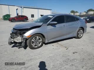 ✅ 2017 Honda Civic LX • VIN: 19XFC2F5XHE053615 • Lot: 82173135. Listed on Copart with 127,808 mi. Free auction sales archive from the USA and detailed vehicle history report at DreamBid. Image 1.